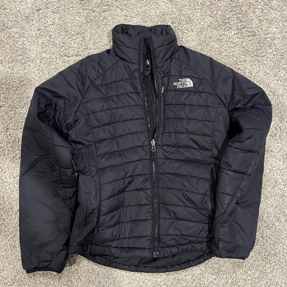 Small women’s puffer, synthetic insulation.